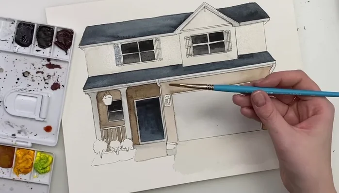 Painting the stonework using a filbert brush and varying shades of brown and black.