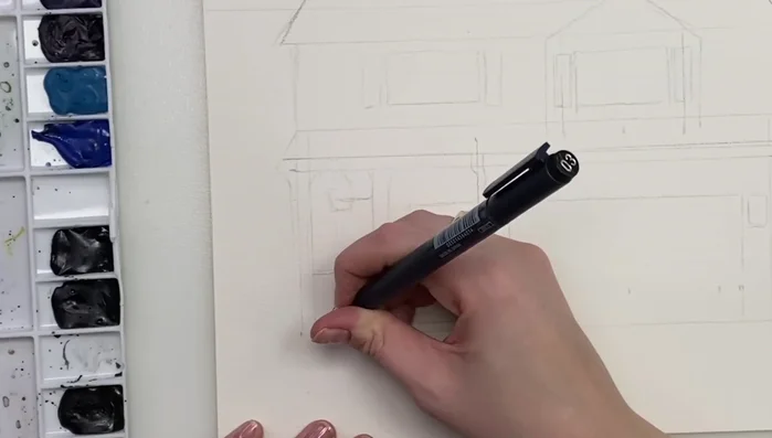 Adding details to plants using a fine-liner pen.