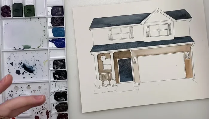 Painting the house trim with a very light gray wash, adding darker shadows.