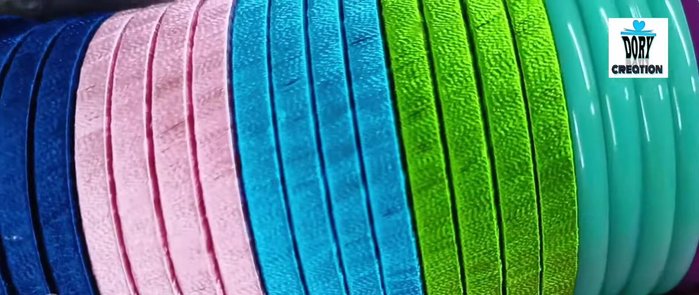 Apply stones: Using the glue pen, apply a small amount of glue to the back of each stone. Press the stone firmly onto the bangle, ensuring it adheres completely. Repeat until all stones are attached. Adjust stone placement as needed for optimal design.