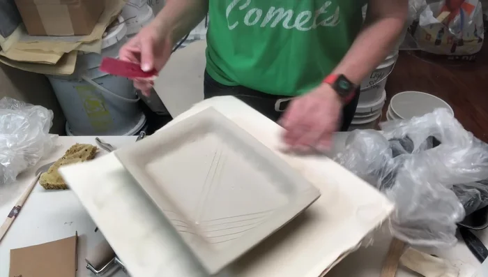 Cleaning up the interior and trimming the corners.