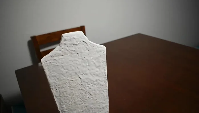 Paint the entire jewelry stand with black matte acrylic paint.