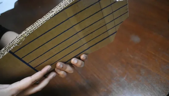 Glue the three cardboard pieces together to create a sturdy stand.