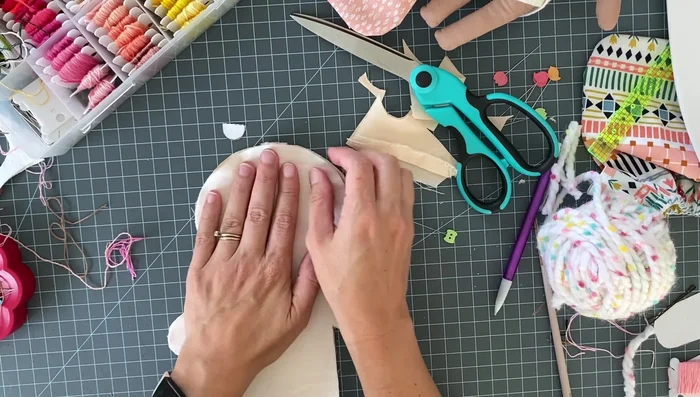 Sew the doll together using a quarter inch seam allowance, using a smaller stitch length for curves. Remember to back stitch at the beginning and end.