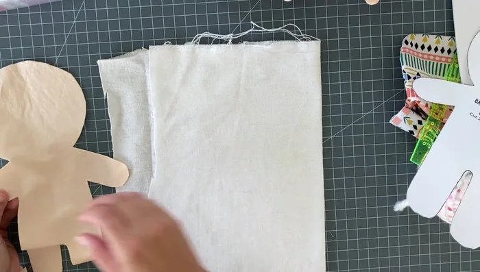 Baste the flannel pieces to the skin tone fabric pieces (or pin and baste each piece separately to the flannel for easier sewing with children).