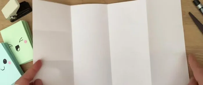 Open the paper completely. You should have 16 rectangles.