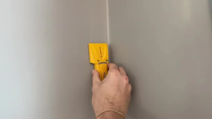 Determine shelf placement and measure the diagonal distance across the corner to find the shelf length. Mark your desired shelf heights.