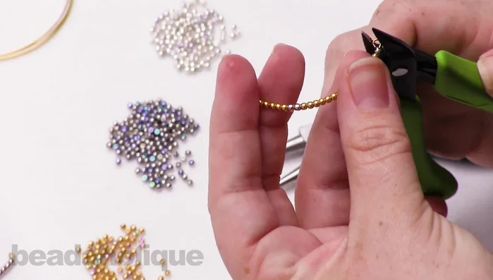 Crimp the second loop with crimping pliers for extra security (optional).