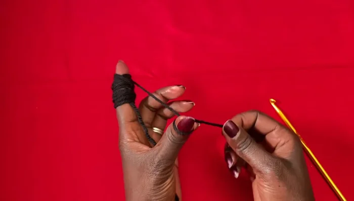 Join the neckline with a slip stitch. This creates the neck opening of the poncho.