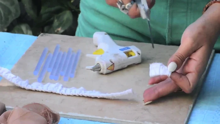 Prepare the headband base: Cut a 3-4 inch wide strip of chiffon.