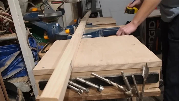 Assemble the base, using screws and a speed square to ensure square corners.