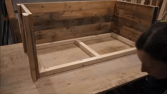 Attach the walls to the base, starting with a few brad nails from the outside, then screwing from the inside.