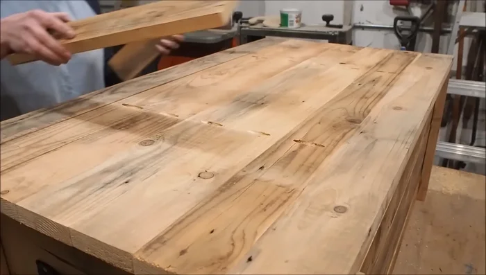 Add decorative support pieces to hide pocket screws and nail them into place.