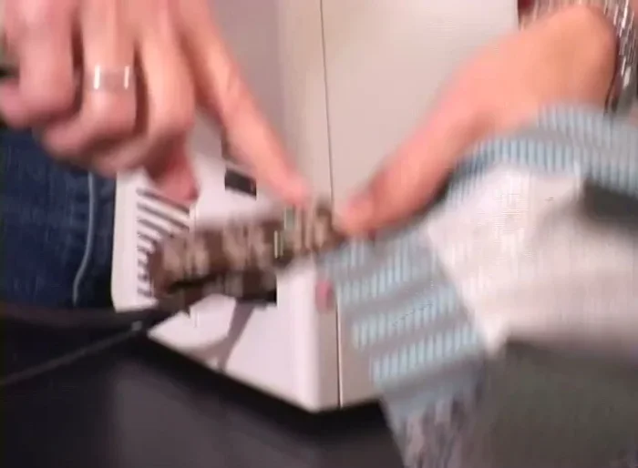 Sew a line along the bottom edge of the tab to secure it and ensure it hangs flat.