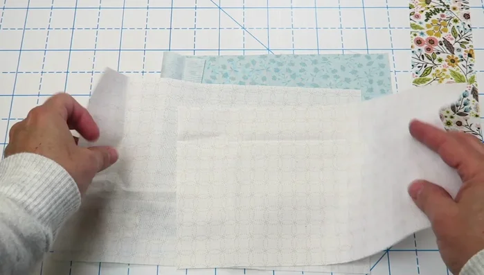 Trim the front pocket to 8 inches tall by 11 inches wide.