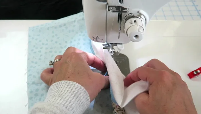 Trim the front pocket to 8 inches tall by 11 inches wide.