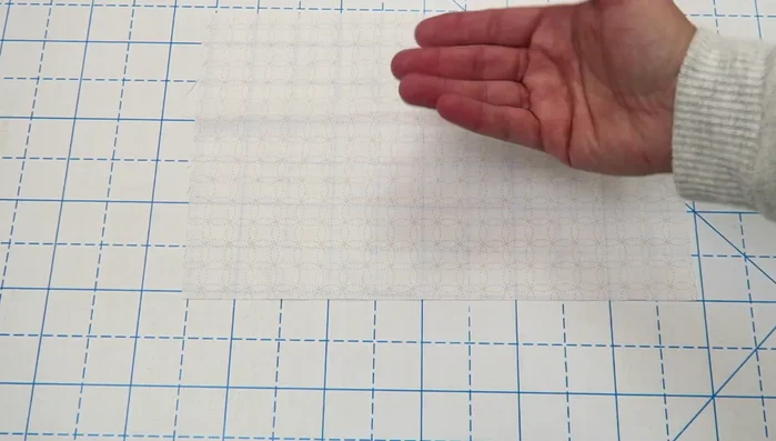 Trim the front pocket to 8 inches tall by 11 inches wide.