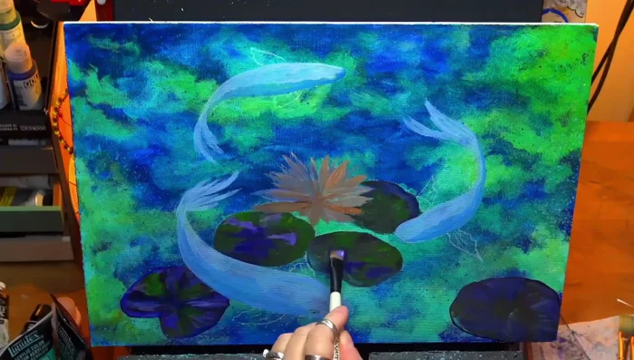 Adding yellows and purples to the lotus flower.