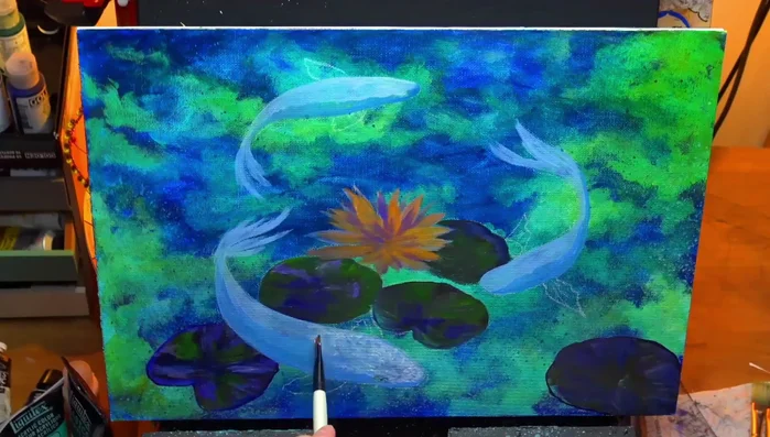 Adding orangey red for fish markings, using dabbing motion and varying the intensity for visual texture.