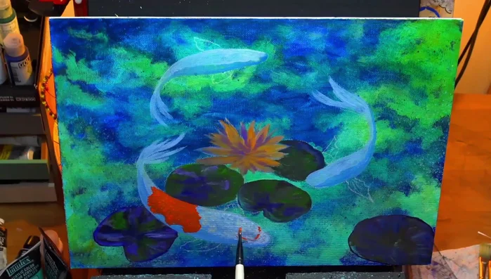 Adding orangey red for fish markings, using dabbing motion and varying the intensity for visual texture.