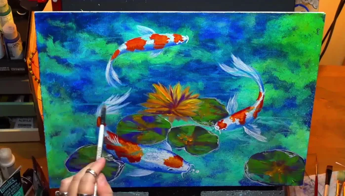 Adding final details using a liner brush to enhance the overall composition.