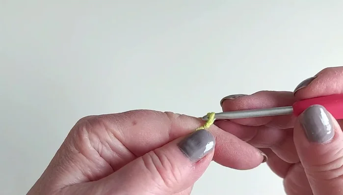 Make a pico: chain 3, insert hook into the first chain, yarn over and pull through.