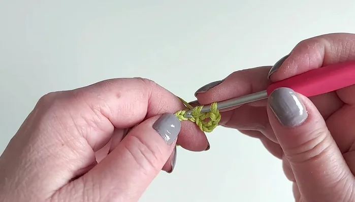 Make a pico: chain 3, insert hook into the first chain, yarn over and pull through.