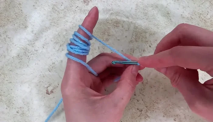 Work 12 double crochet stitches into the ring.