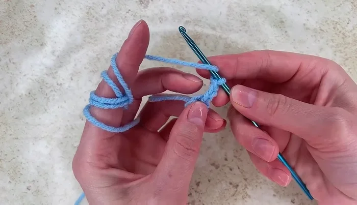 Work 12 double crochet stitches into the ring.