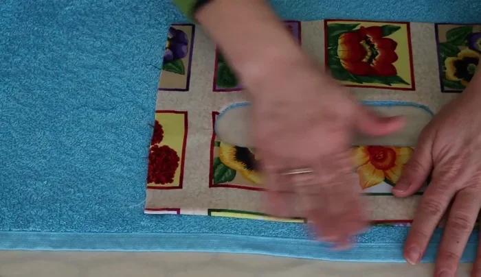 Top stitch around the folded edges.