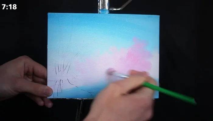 Use a small round brush with Mars black and burnt umber to add branches and tree trunks in the distance, allowing them to mix with the pink underneath for a natural look.