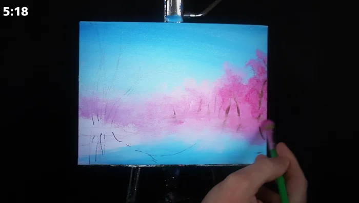 Dab more pink over portions of the piece to show leaves overlapping branches, creating depth and visual interest.