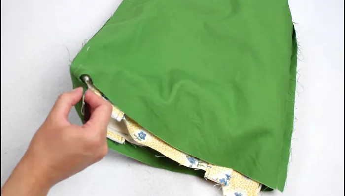 Turn and finish: Turn the bag right side out through the opening left in the lining. Close the opening with a top stitch or hand-sew a ladder stitch. Press the top edge and top stitch around the bag.