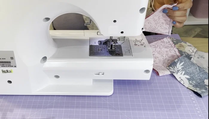 Repeat step 3 for the opposite side, leaving a small gap to turn the fabric inside out. Avoid wasting thread by leaving a small gap before back stitching and cutting.