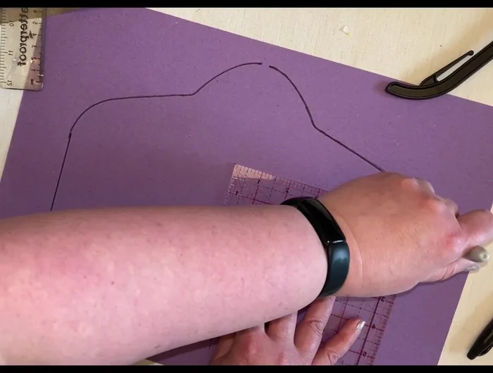 Cut out the pattern and use it to cut two outer fabric pieces and interface them. Cut a piece of pocket fabric (approx. 10x20 inches).