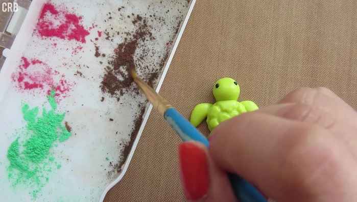 Add a blush using red or pink chalk pastels.