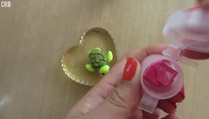 Add a blush using red or pink chalk pastels.