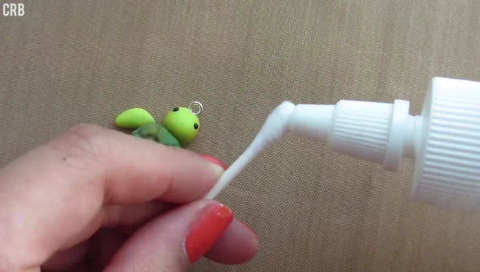 Clean off excess chalk pastel with a cotton swab and acetone.