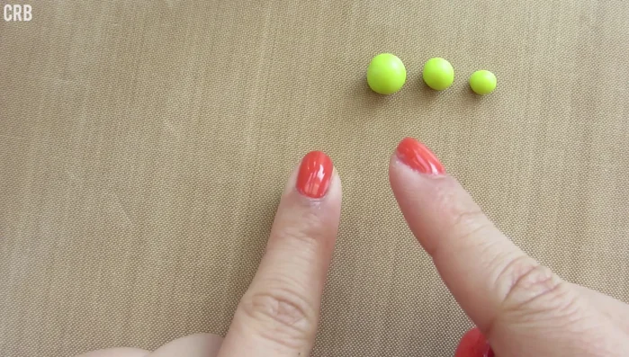 Shape the largest clay ball into an upside-down teardrop for the shell.