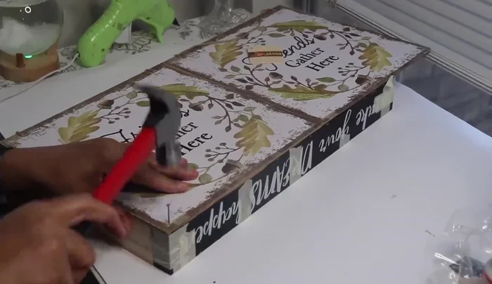 Reinforce the base: Nail the base securely to the tray frame for added strength.