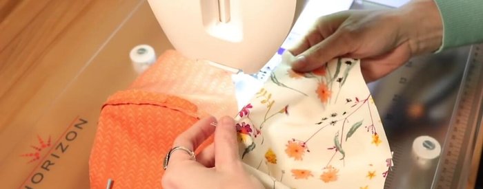 Sew the exterior and lining pieces together at the top and bottom edges, right sides together, leaving the sides open to turn.