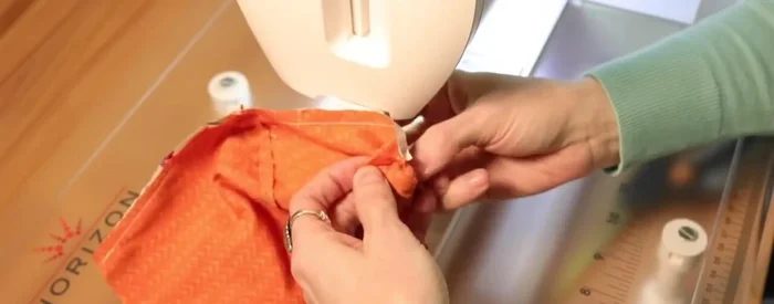 Turn the mask right side out and press the seams flat.