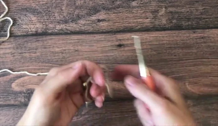 Round 1: Chain 2, then work 12 double crochets into the magic circle, working over both strands of the loop. Join with a slip stitch.