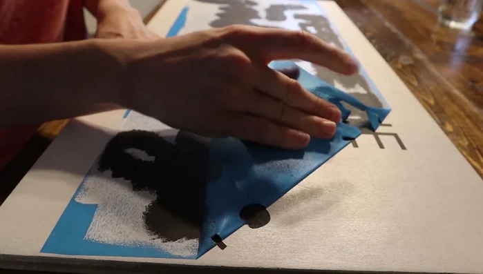 Peel the stencil off once the paint is completely dry. Weed out excess vinyl.