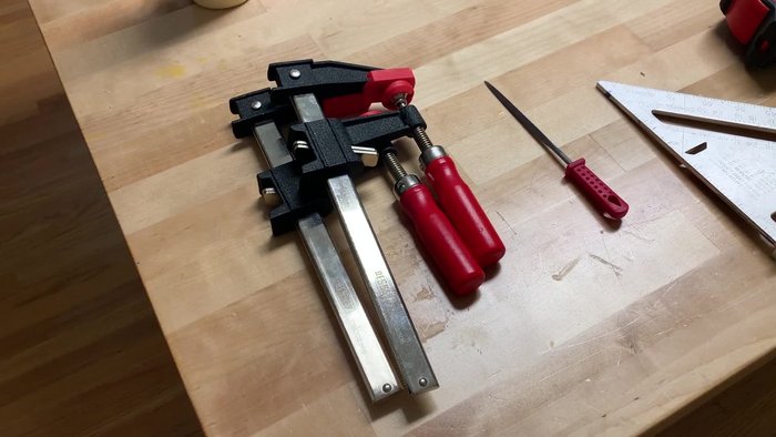 Measure and cut the main pieces of red oak wood according to your drawer dimensions. Create slots using a jigsaw, ensuring to cut slightly inside the lines for a snug fit.