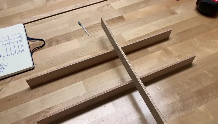 Assemble the main pieces by carefully fitting them together, checking for proper alignment and snugness before gluing.