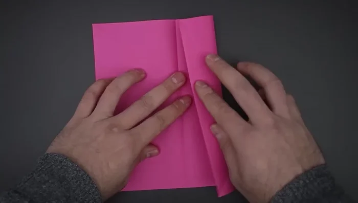 Repeat step 3 to divide the paper into 16 smaller squares.