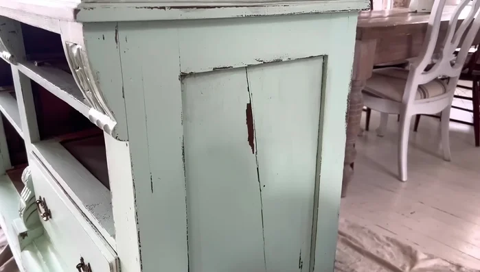 Apply clear wax to blend and control dark wax application (optional)