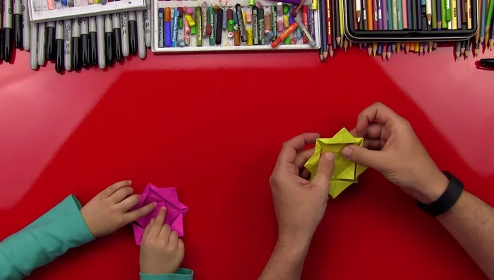 Optional: Refine the petals by folding them slightly more to create a sharper point.