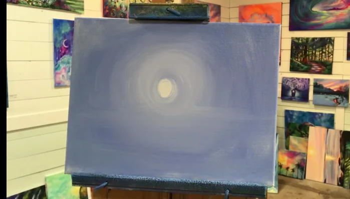 Smooth and add highlights. Use a filbert brush to smooth the edges around the moon and add soft ripples or highlights to suggest water or snow.